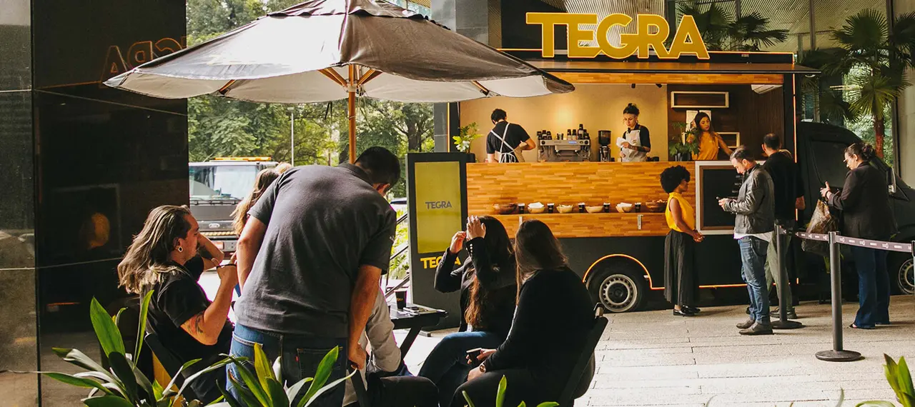 Banner do Truck Expresso Tegra, um encontro itinerante entre pessoas, ideias e experiências.